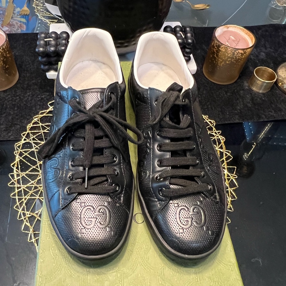 100% authentic GG Embossed Ace Sneakers